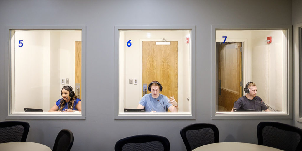 Wake Forest Spanish professor Ola Furmanek teaches her graduate program in translation and interpretation in the new lab space in Greene Hall on Thursday, April 19, 2018. The space features nine interpretation booths where students can record themselves translating an audio recording, and the professor can listen to the students live or recorded.